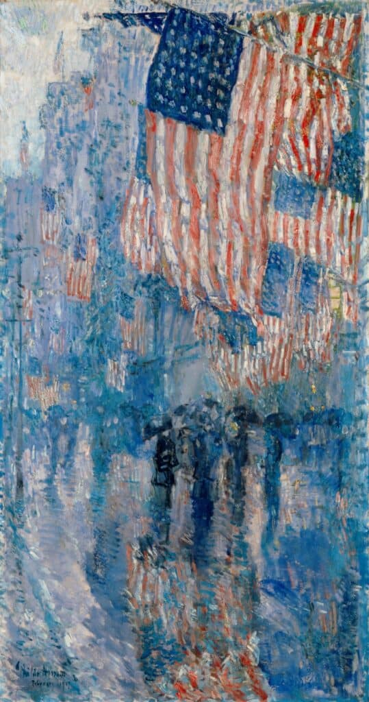 The Avenue in the Rain (Februar 1917): US-Flaggen und Spiegelungen verwandeln die regennasse Fifth Avenue in ein blau-rotes Muster.