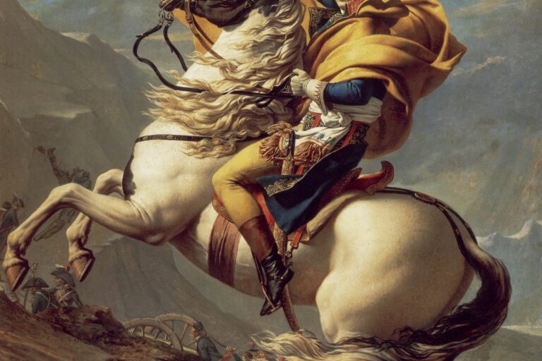 Bonaparte has an orange cloak, the crispin (cuff) of his gauntlet is embroidered, the horse is piebald, black and white, and the tack is complete and includes a standing martingale